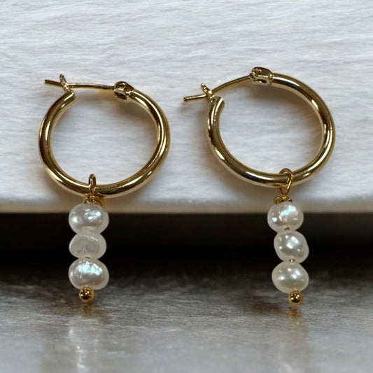 Hoop with triple seed pearl earring