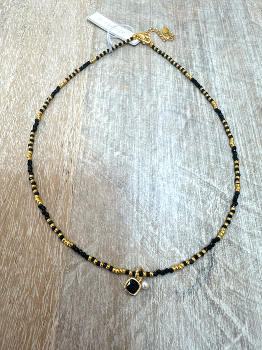 Delicate Gold and Black Necklace with Petite Drop